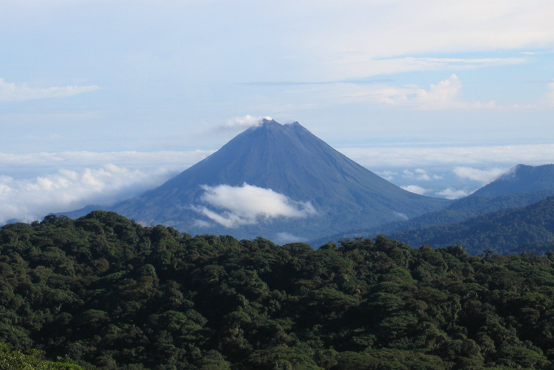 Arenal Volcano above rainforest as seen from the Monteverde highlands